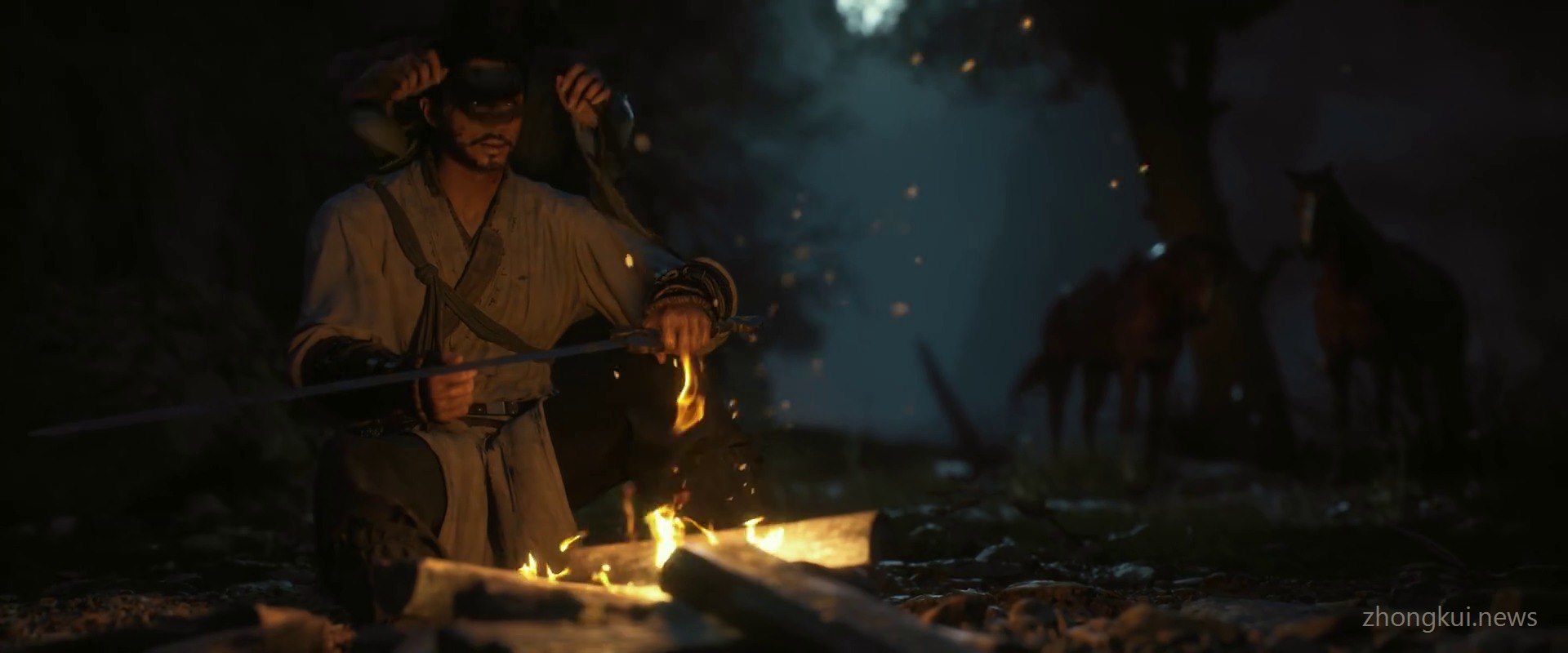 The blindfolded swordsman at a campfire holding a burning talisman, two horses in the dark behind him